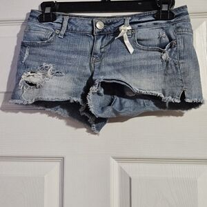 Aeropostale Distressed Blue Jean Shorts are a size 1/2.